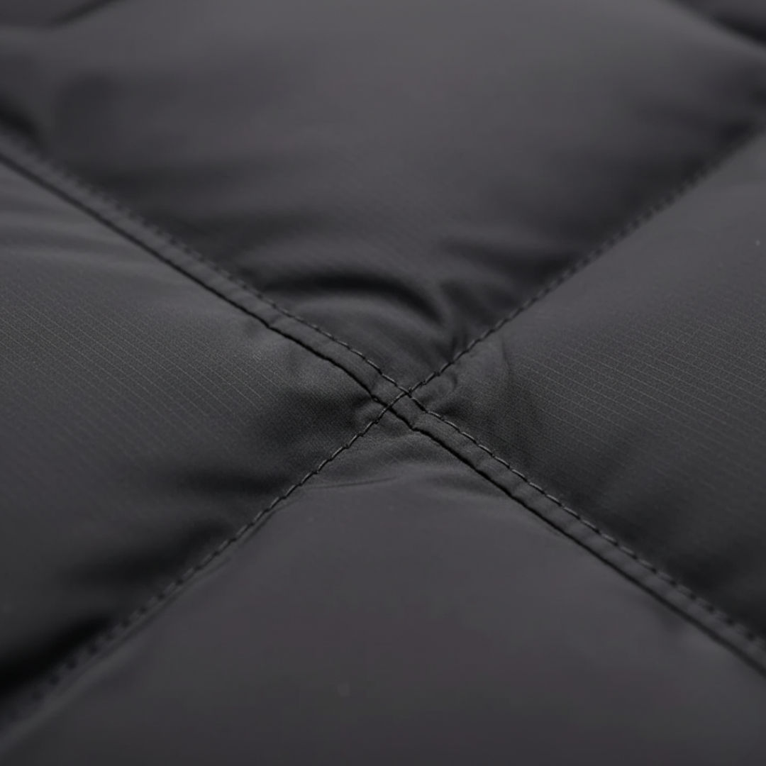 Piumino uomo in materiale sintetico nero