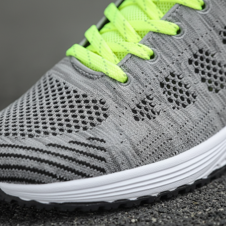 Scarpe da corsa donna nere in mesh traspirante con suola bianca