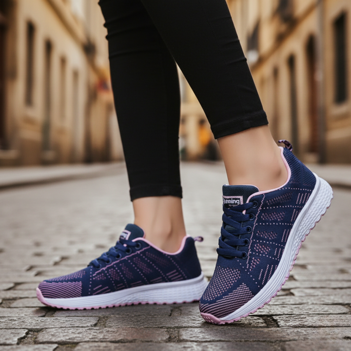 Scarpe da corsa donna nere in mesh traspirante con suola bianca