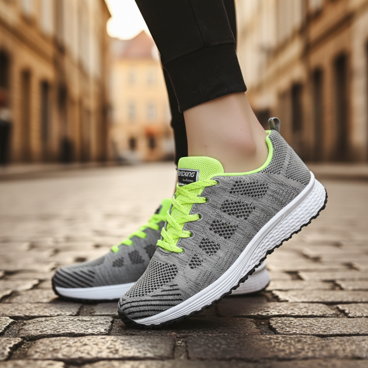 Scarpe da corsa donna nere in mesh traspirante con suola bianca