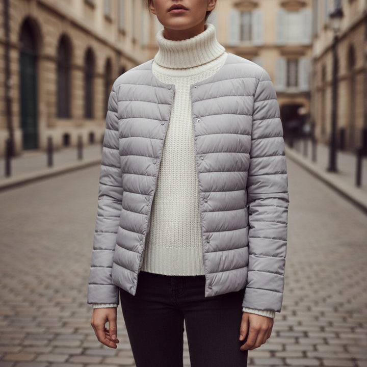 Piumino donna lungo con cappuccio e imbottitura