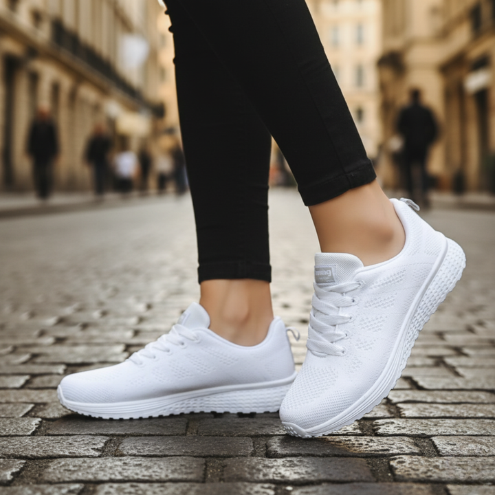 Scarpe da corsa donna nere in mesh traspirante con suola bianca