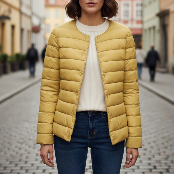 Piumino donna lungo con cappuccio e imbottitura